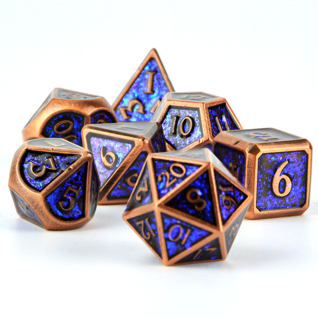Metal Magic 7 piece dnd poly dice set in a bronze / copper finish with blue glitter
