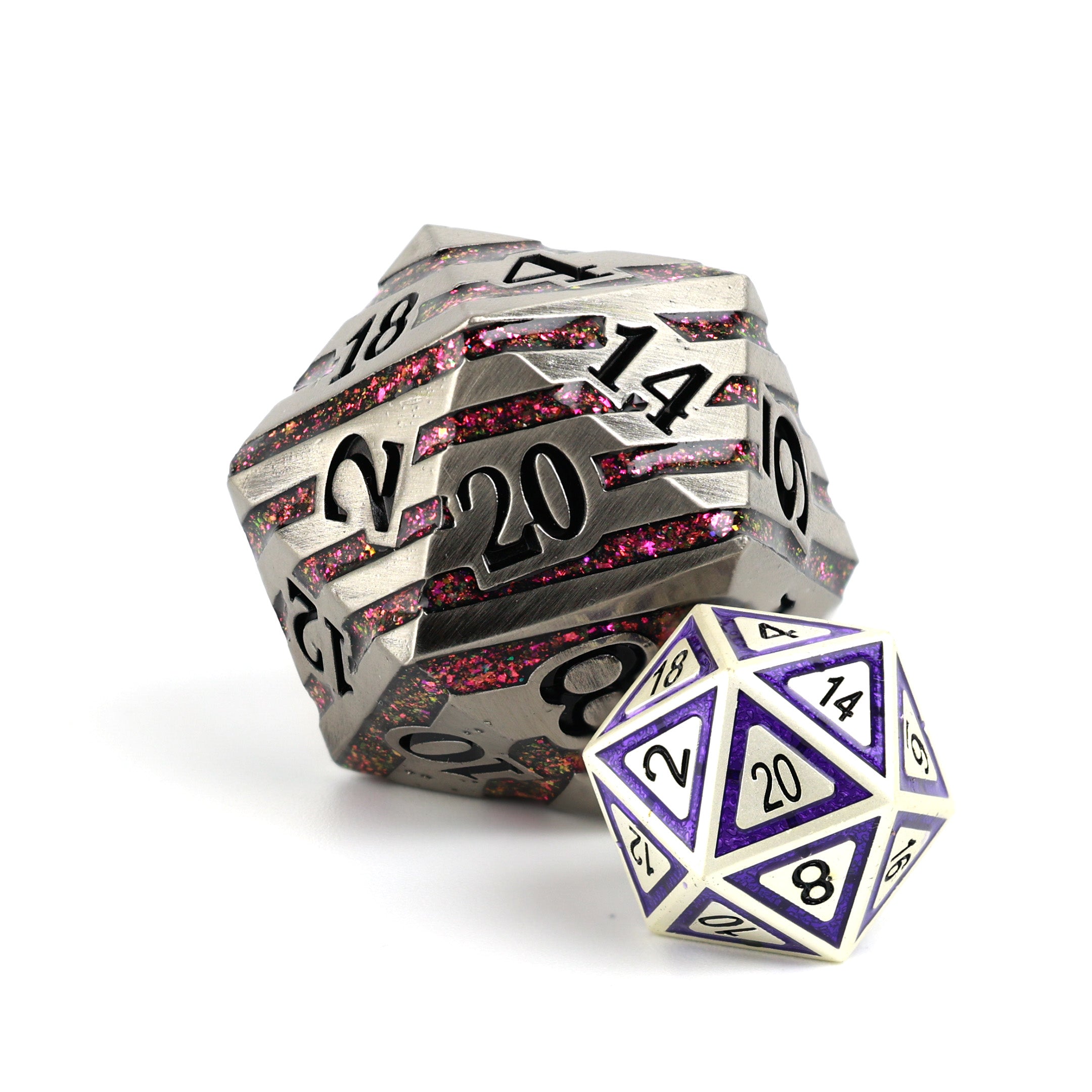 Two polyhedral dice with metallic and gemstone-like finishes on a white background