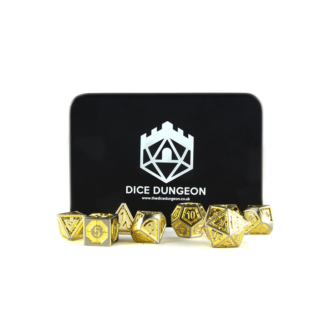 golden metal dnd dice with tin