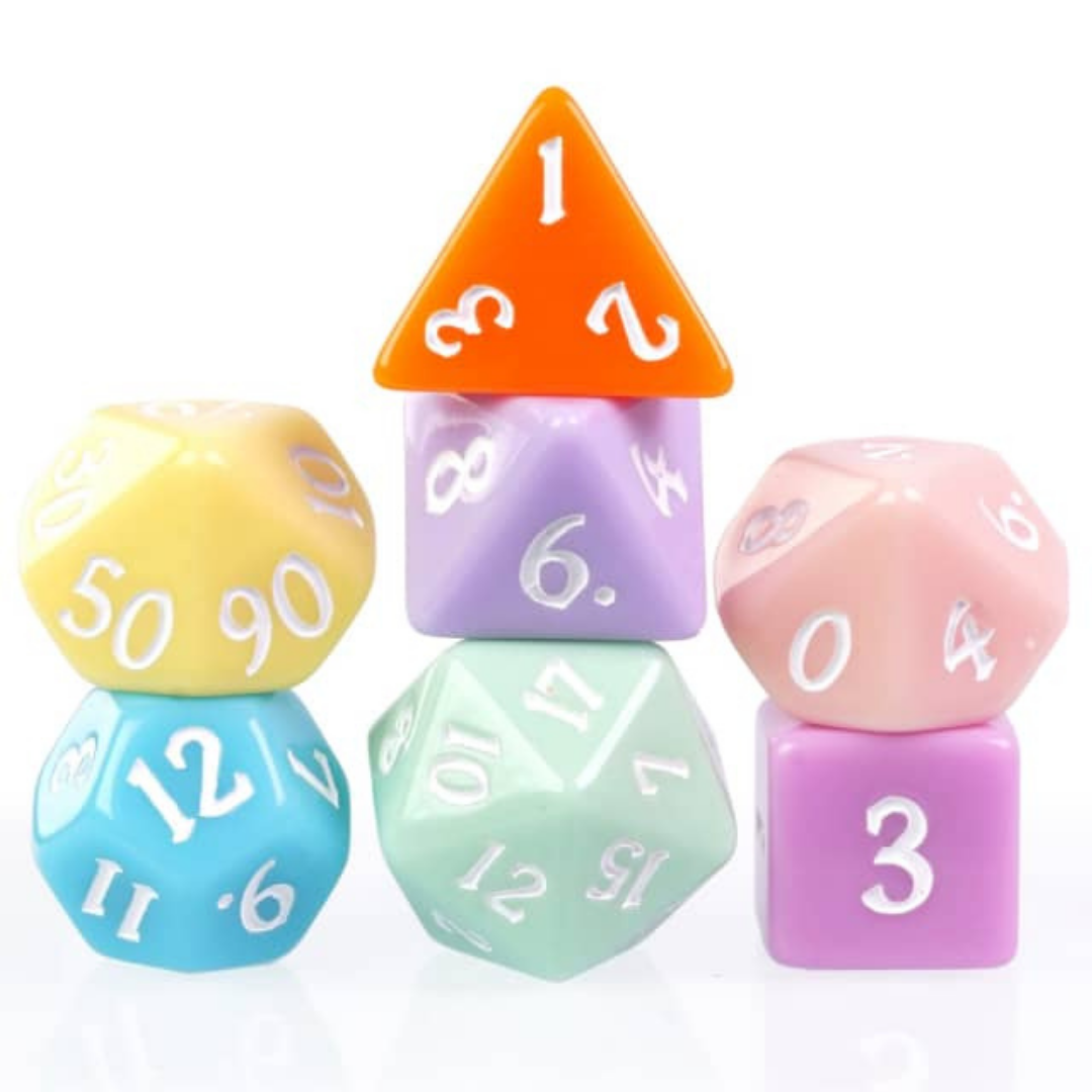 Pastel coloured dice stacked on top of each other.