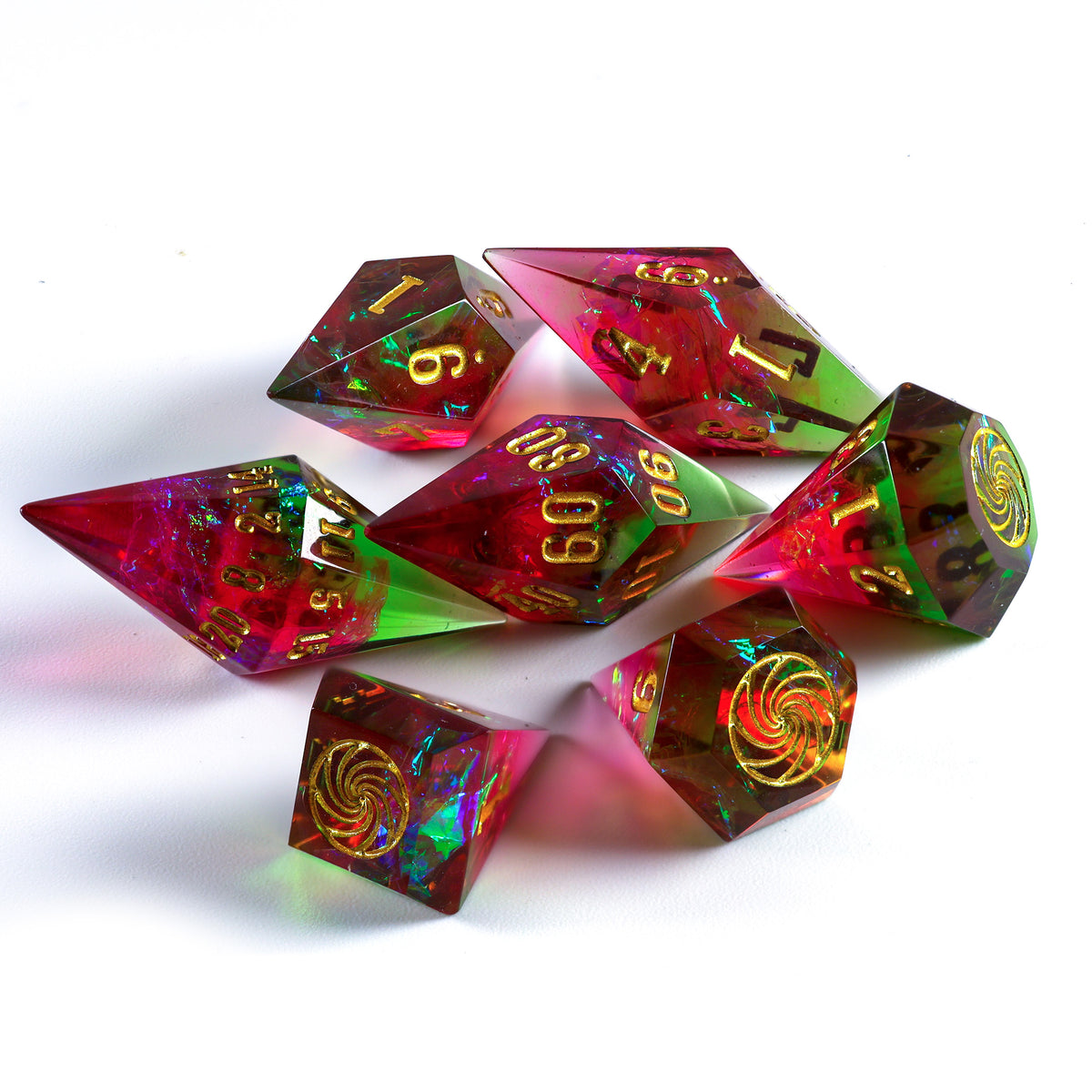 A set of holographic polyhedral dice with gold numbering and swirl designs, displayed on a clean white background.