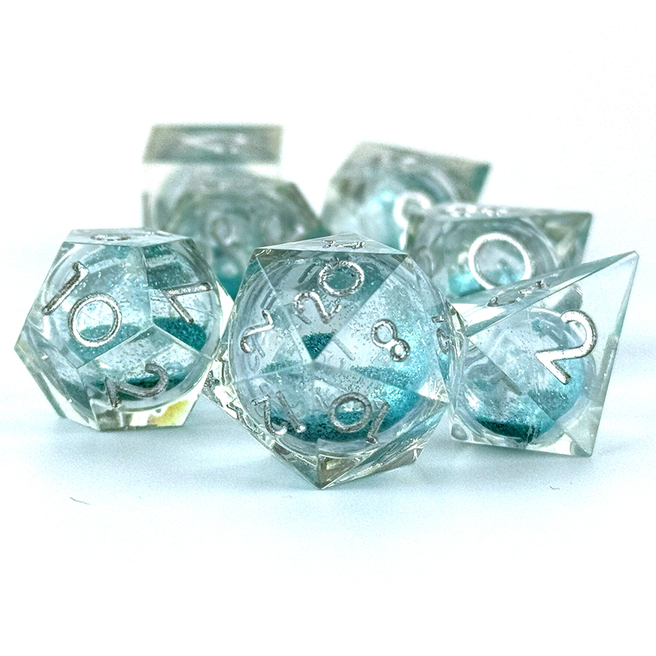 Dungeons and Dragons liquid core resin dice light blue glitter and silver text