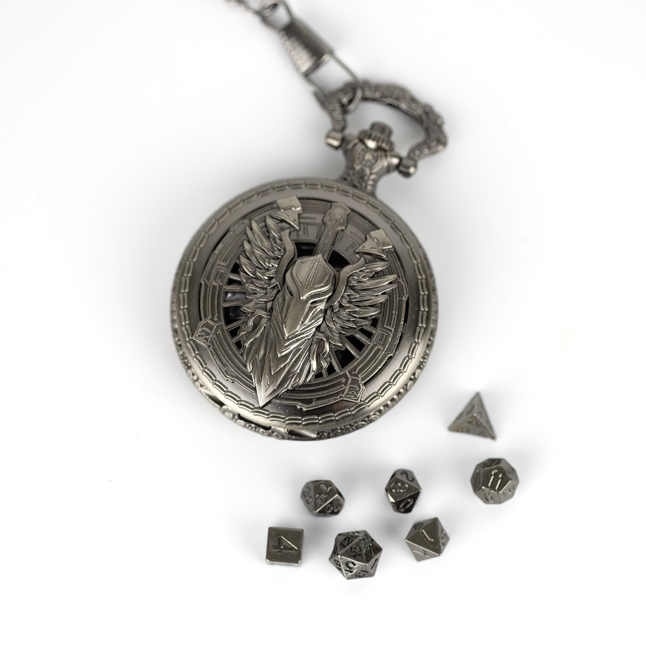 Decorative pocket watch with an eagle emblem and surrounding dice on a white background