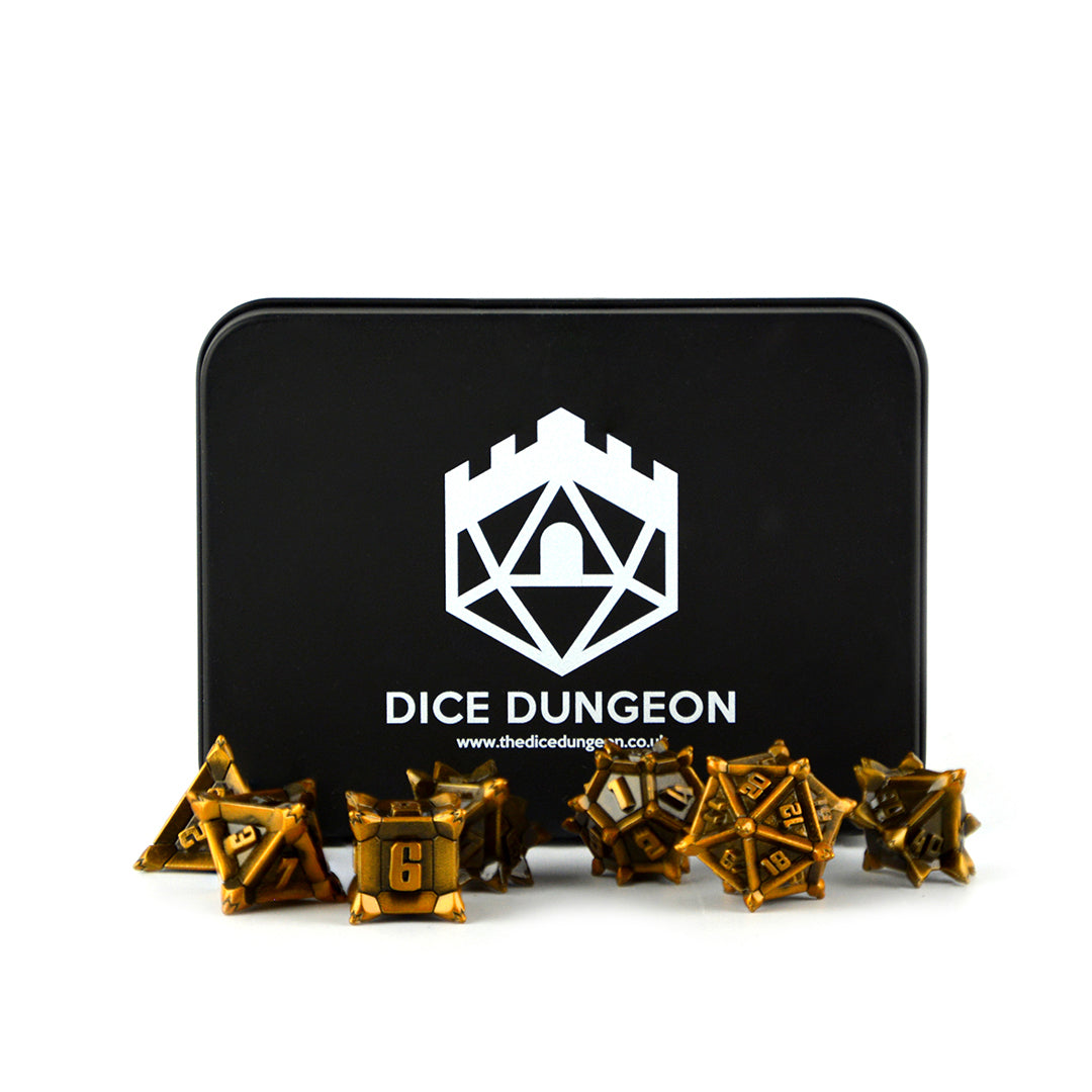 golden pointy pinwheel dnd dice with tin